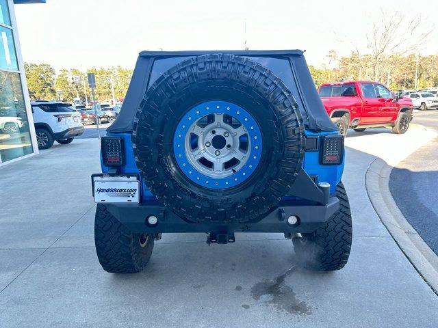 used 2016 Jeep Wrangler Unlimited car, priced at $25,974