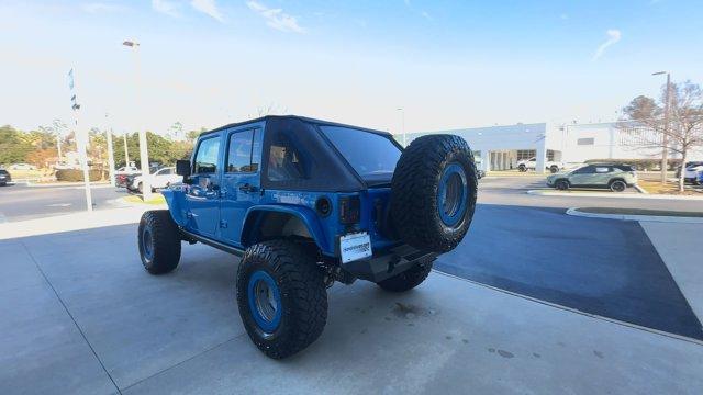 used 2016 Jeep Wrangler Unlimited car, priced at $25,974