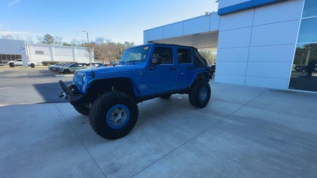 used 2016 Jeep Wrangler Unlimited car, priced at $25,974