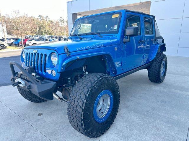 used 2016 Jeep Wrangler Unlimited car, priced at $25,974