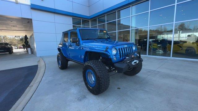 used 2016 Jeep Wrangler Unlimited car, priced at $25,974