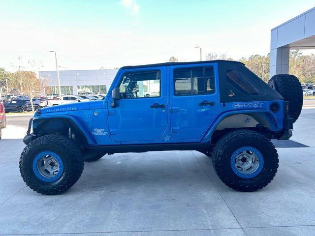 used 2016 Jeep Wrangler Unlimited car, priced at $25,974