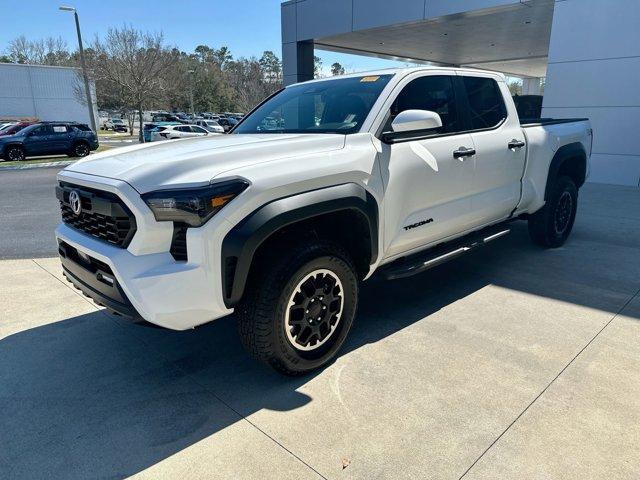 used 2024 Toyota Tacoma car, priced at $49,021