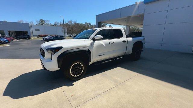 used 2024 Toyota Tacoma car, priced at $49,021