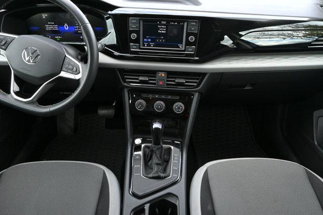used 2023 Volkswagen Taos car, priced at $20,000