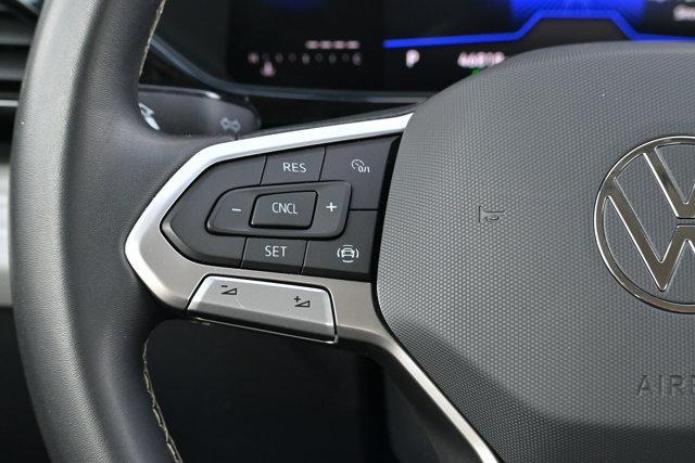 used 2023 Volkswagen Taos car, priced at $20,000