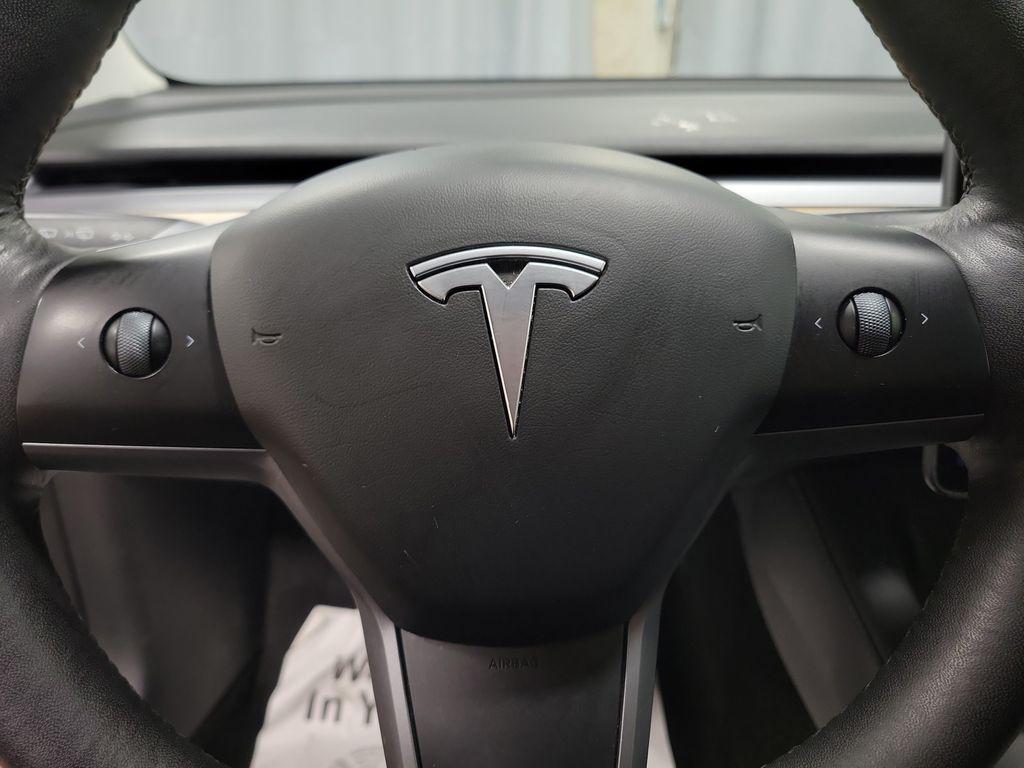 used 2023 Tesla Model 3 car, priced at $20,995