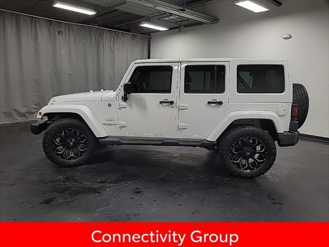 used 2012 Jeep Wrangler Unlimited car, priced at $13,995