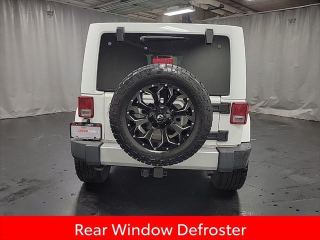 used 2012 Jeep Wrangler Unlimited car, priced at $13,995