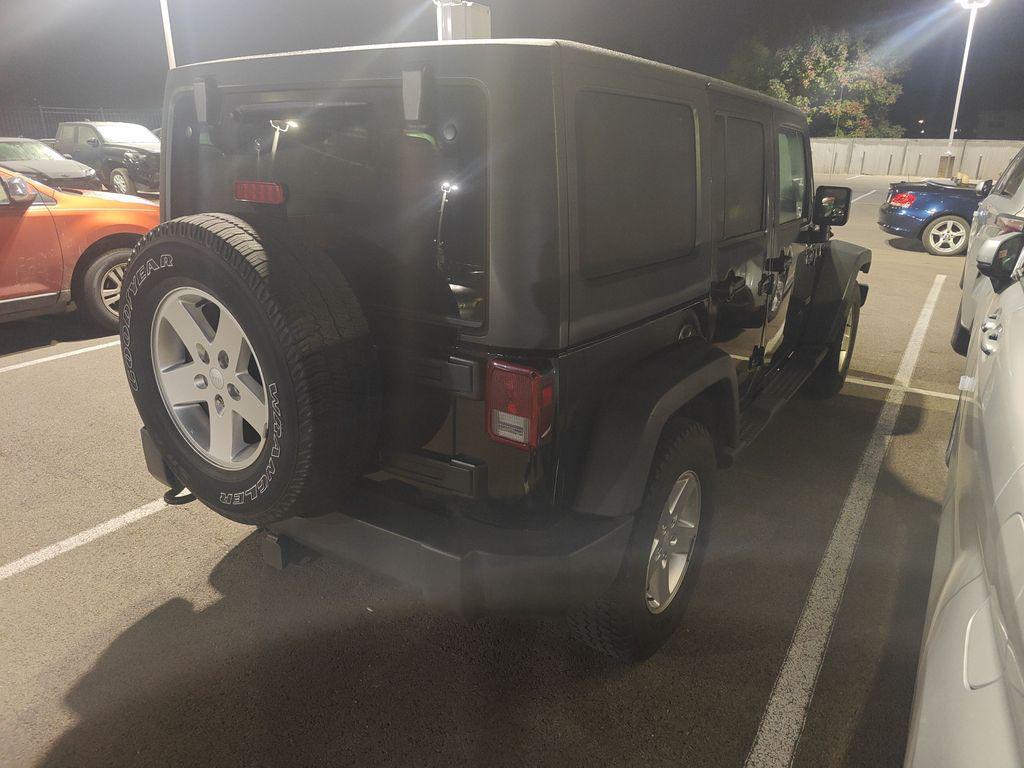 used 2011 Jeep Wrangler Unlimited car, priced at $9,995