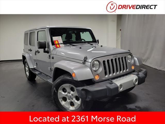 used 2014 Jeep Wrangler Unlimited car, priced at $17,994