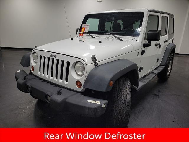 used 2013 Jeep Wrangler Unlimited car, priced at $14,995