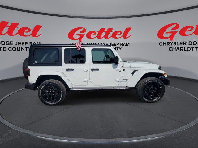 used 2023 Jeep Wrangler 4xe car, priced at $28,859