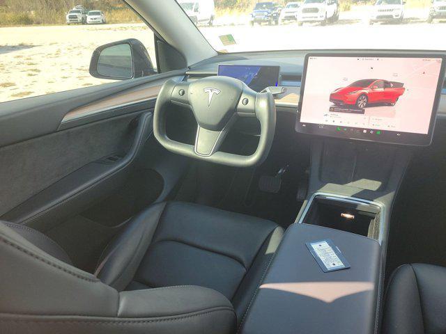 used 2024 Tesla Model Y car, priced at $34,399