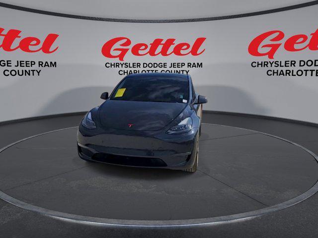 used 2024 Tesla Model Y car, priced at $34,399