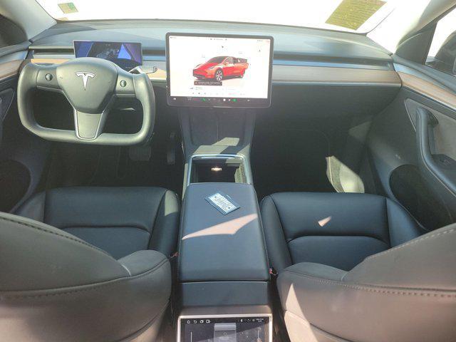 used 2024 Tesla Model Y car, priced at $34,399