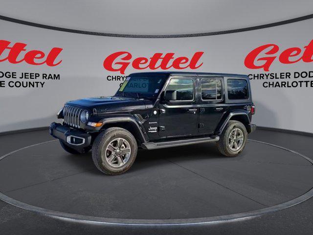 used 2021 Jeep Wrangler Unlimited car, priced at $31,499