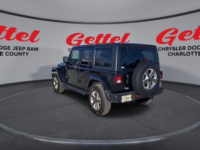 used 2021 Jeep Wrangler Unlimited car, priced at $31,499