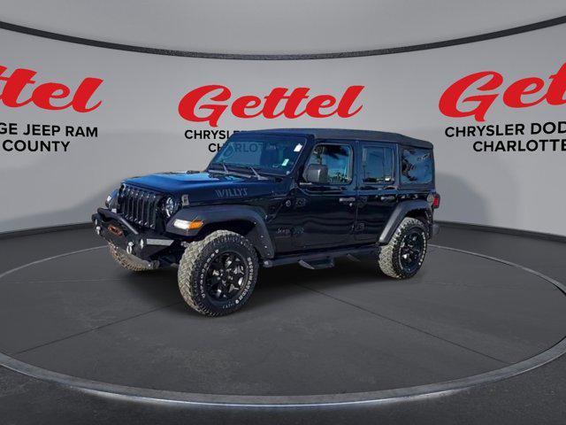 used 2023 Jeep Wrangler car, priced at $33,616