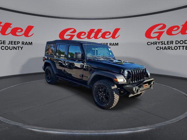 used 2023 Jeep Wrangler car, priced at $33,616