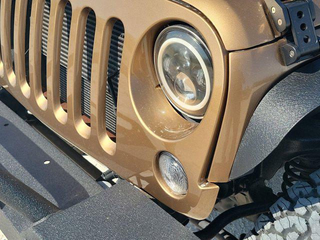 used 2015 Jeep Wrangler Unlimited car, priced at $16,490