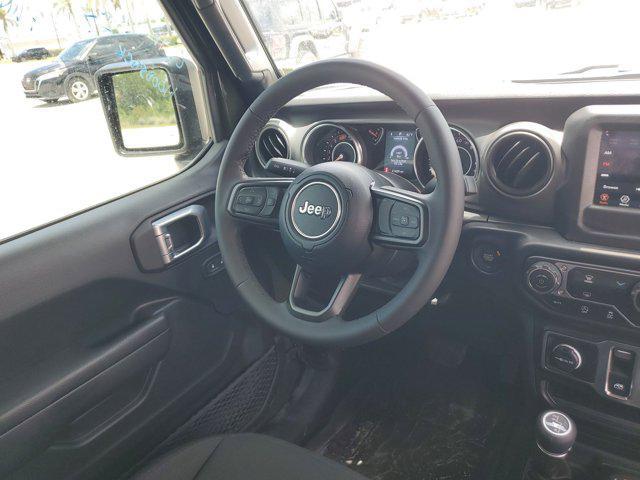 used 2023 Jeep Wrangler car, priced at $29,699