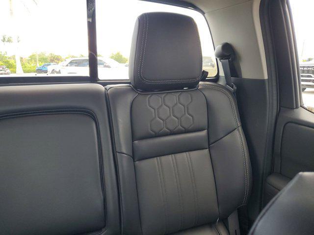 used 2024 Nissan Frontier car, priced at $36,899