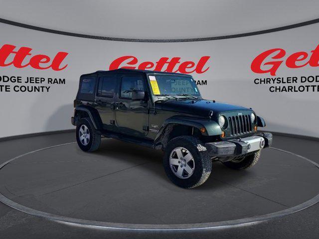 used 2010 Jeep Wrangler Unlimited car, priced at $14,999