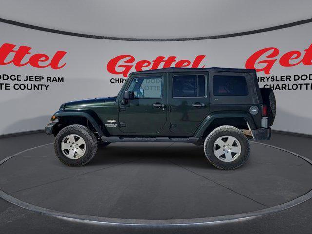 used 2010 Jeep Wrangler Unlimited car, priced at $14,999