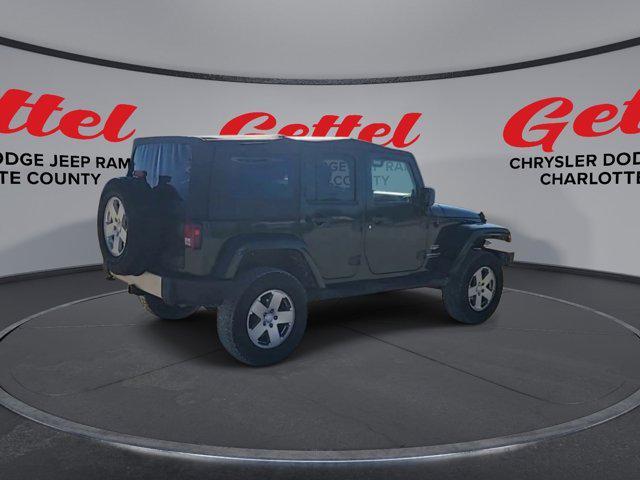 used 2010 Jeep Wrangler Unlimited car, priced at $14,999