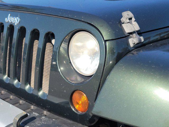 used 2010 Jeep Wrangler Unlimited car, priced at $14,670