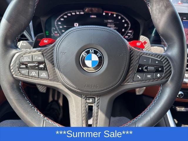 used 2023 BMW M4 car, priced at $76,298