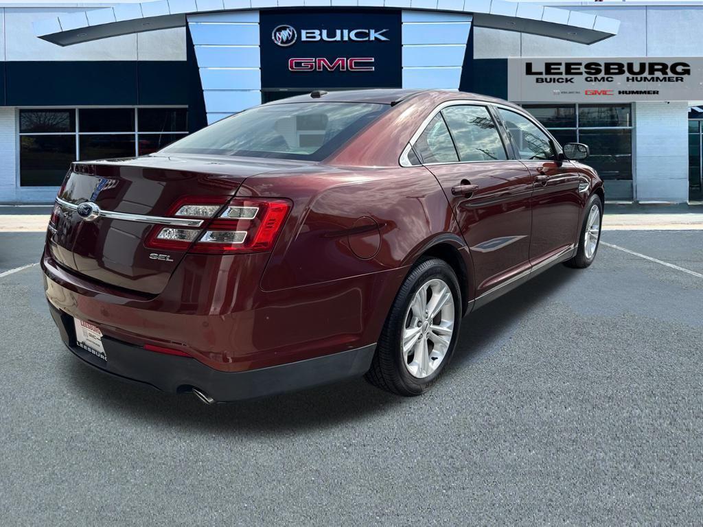 used 2015 Ford Taurus car, priced at $10,692