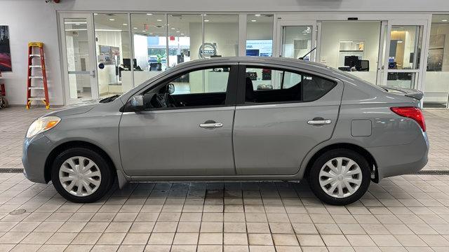 used 2013 Nissan Versa car, priced at $5,800