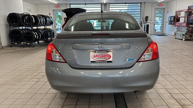 used 2013 Nissan Versa car, priced at $5,800