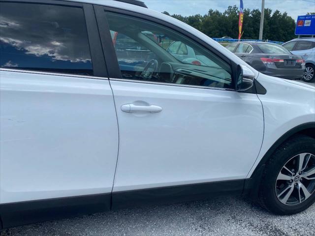 used 2018 Toyota RAV4 car, priced at $22,999