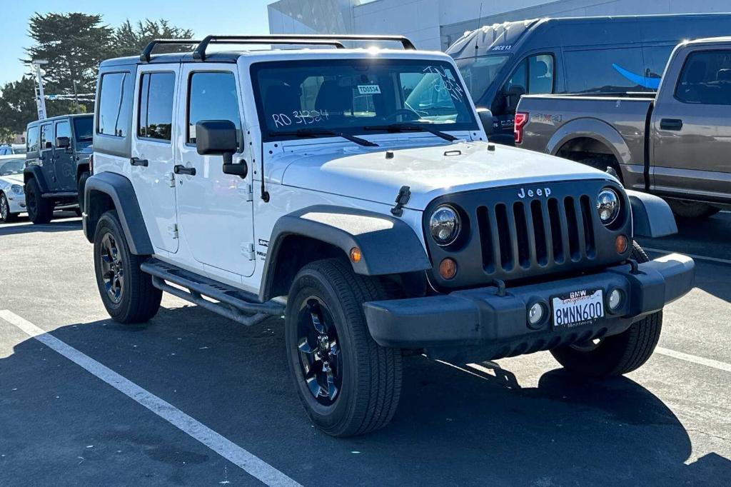 used 2013 Jeep Wrangler Unlimited car, priced at $15,999