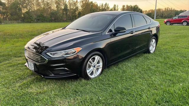 used 2018 Ford Fusion car, priced at $7,995