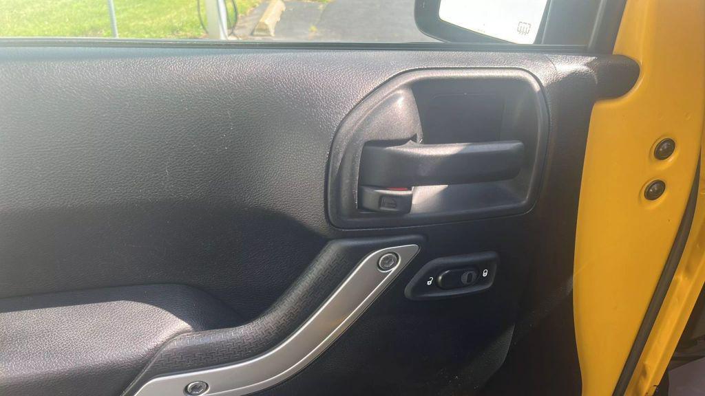 used 2015 Jeep Wrangler Unlimited car, priced at $15,995
