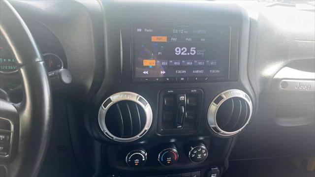 used 2015 Jeep Wrangler Unlimited car, priced at $17,700