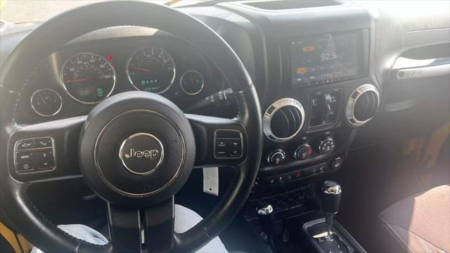 used 2015 Jeep Wrangler Unlimited car, priced at $17,700