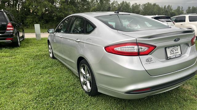 used 2014 Ford Fusion car, priced at $5,995