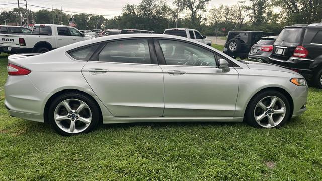 used 2014 Ford Fusion car, priced at $5,995