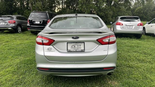 used 2014 Ford Fusion car, priced at $5,995