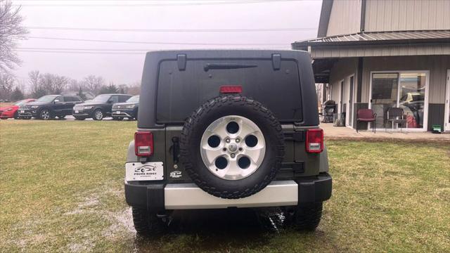 used 2015 Jeep Wrangler Unlimited car, priced at $14,600