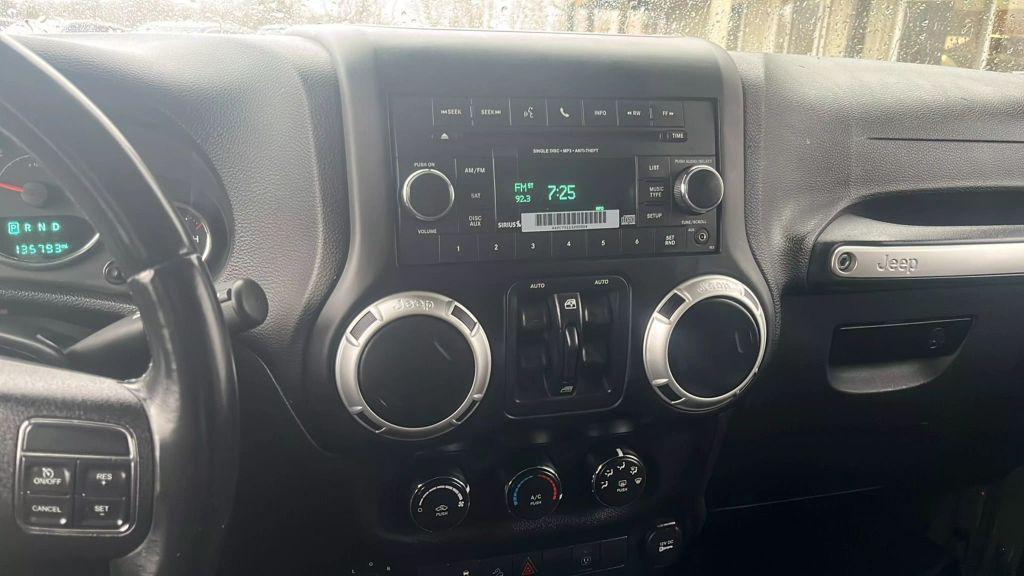 used 2015 Jeep Wrangler Unlimited car, priced at $13,550