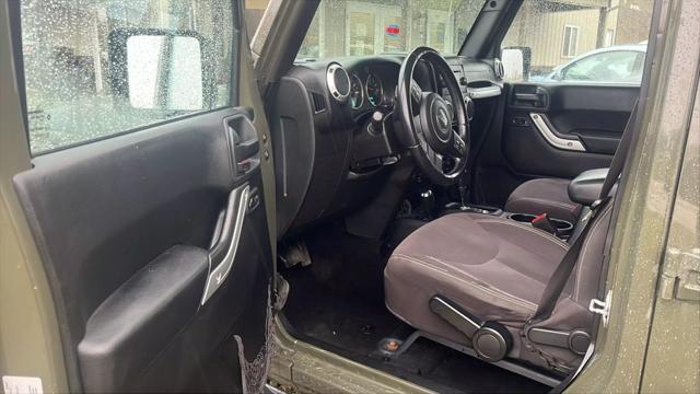 used 2015 Jeep Wrangler Unlimited car, priced at $14,600