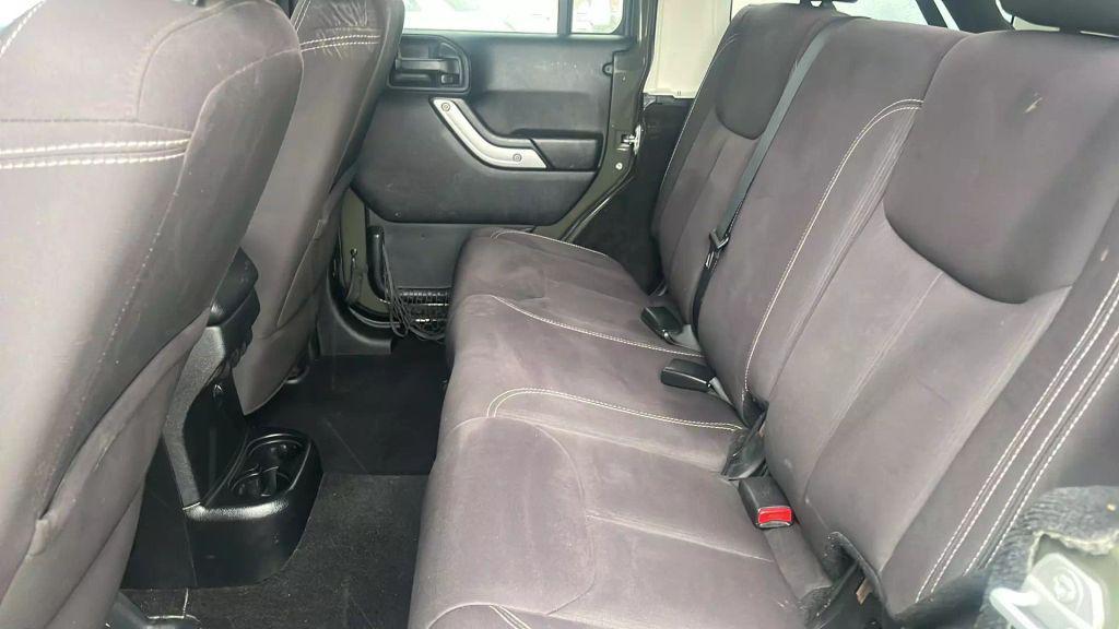 used 2015 Jeep Wrangler Unlimited car, priced at $13,550