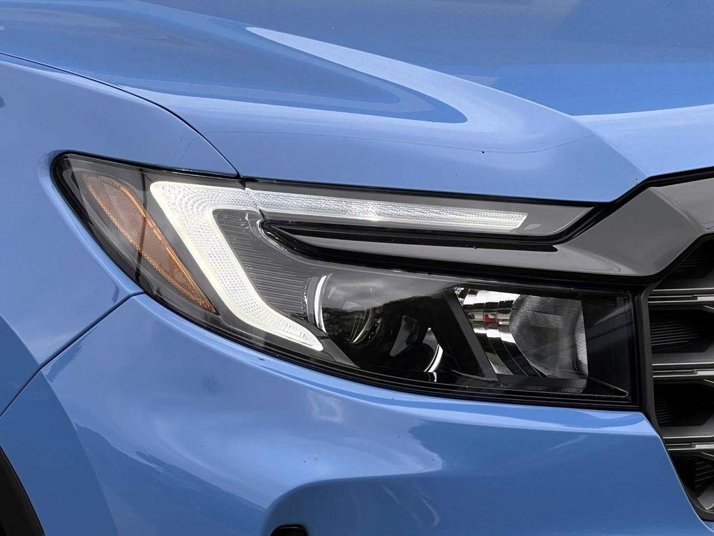 used 2025 Honda Ridgeline car, priced at $35,495