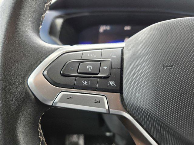 used 2023 Volkswagen Taos car, priced at $21,798